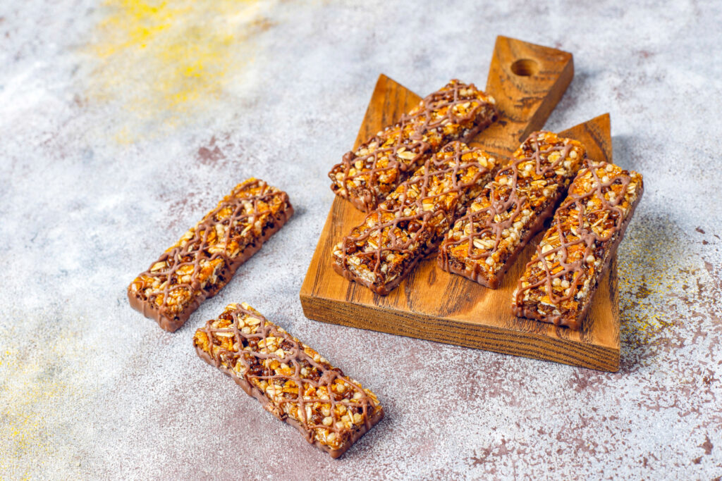healthy delicios granola bars with chocolate muesli bars with nuts dry fruits top view
