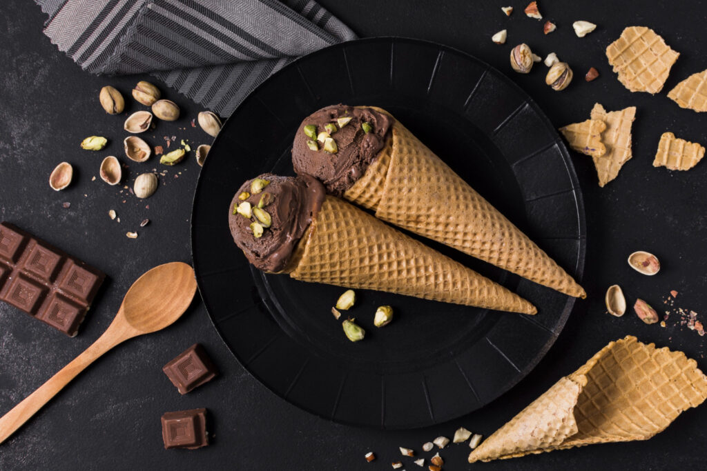 top view set ice cream cones with chocolate