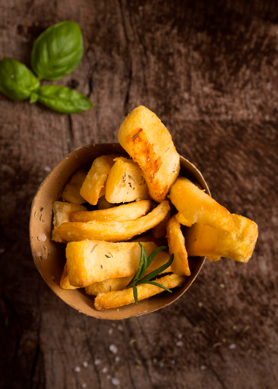 flat lay french fries bowl with herbs