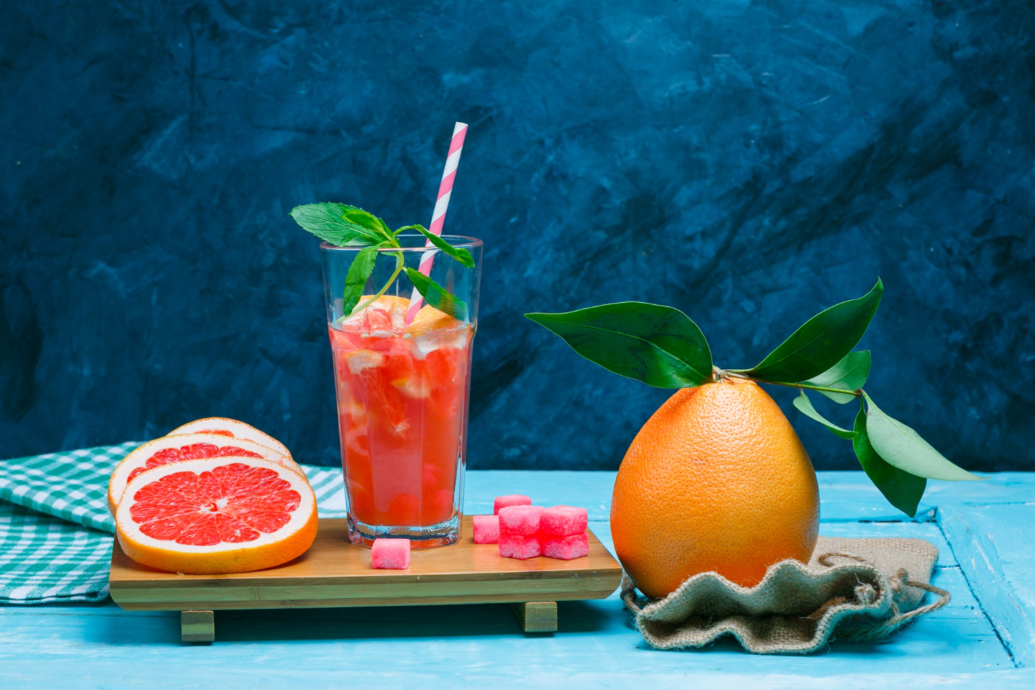 grapefruit drink with picnic cloth