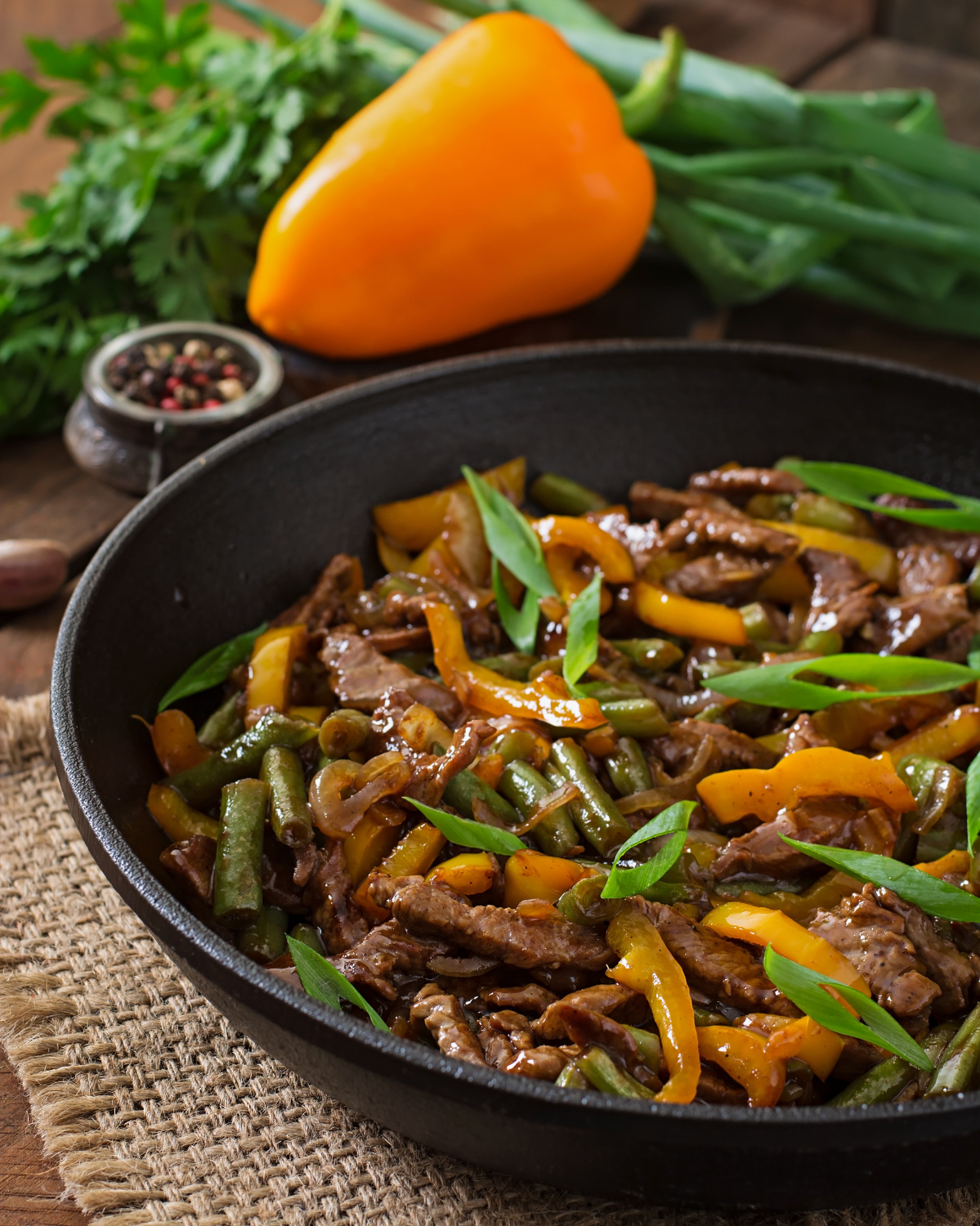 stir frying beef with sweet peppers green beans