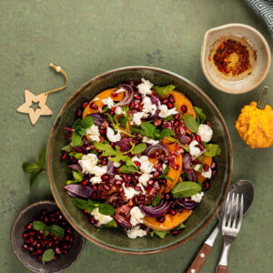 warm winter quinoa salad with pumpkin chorizo mozzarella arugula leaves pomegranate