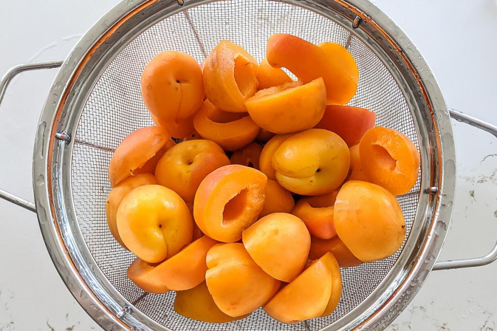 halved apricots in colander 1 1024x683 1